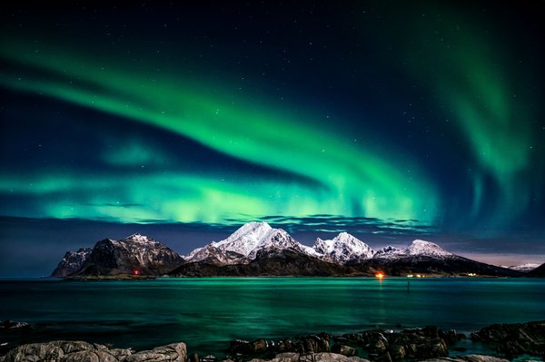 Northern Lights Over Snowy Mountains — space wallpaper, 4K